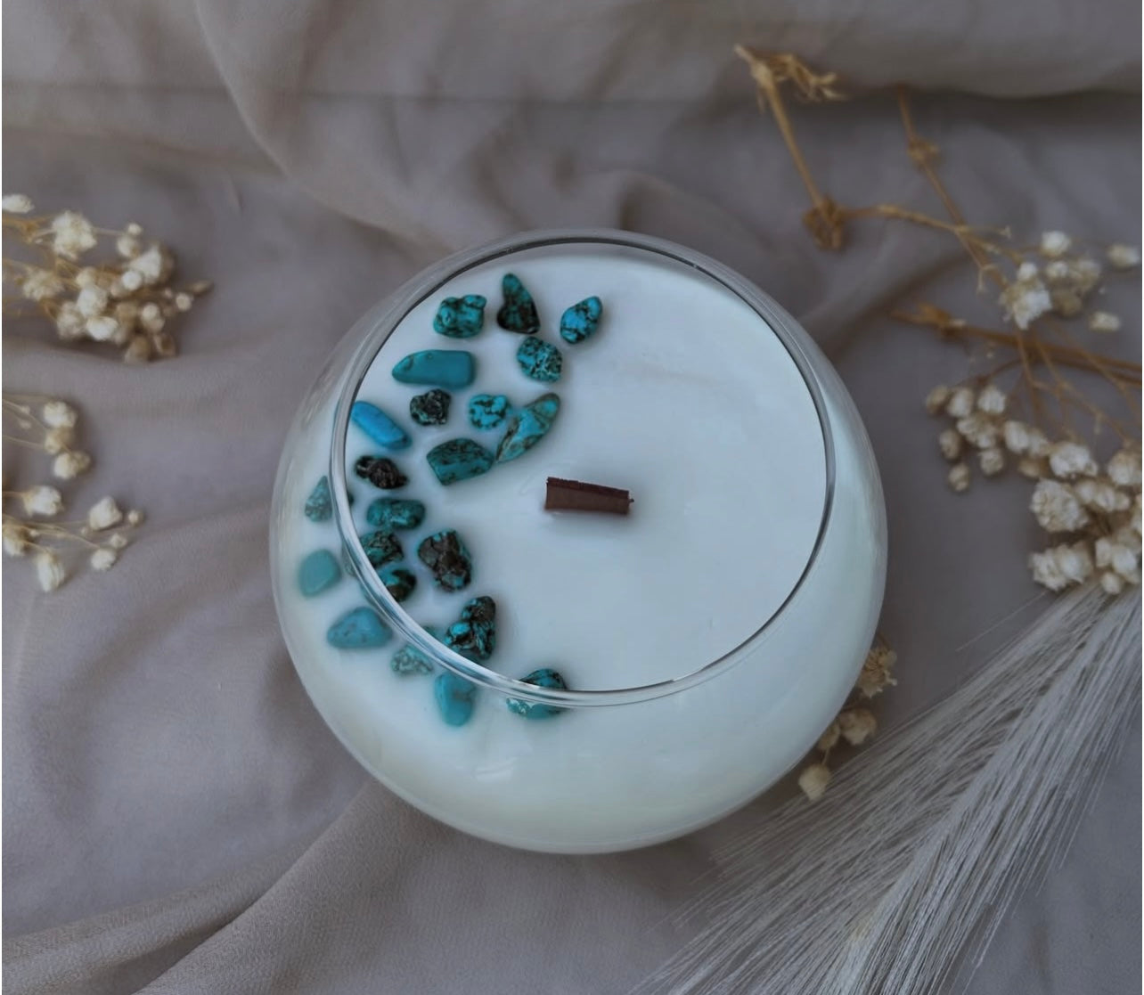 Vela aromática · Gemas decorativas