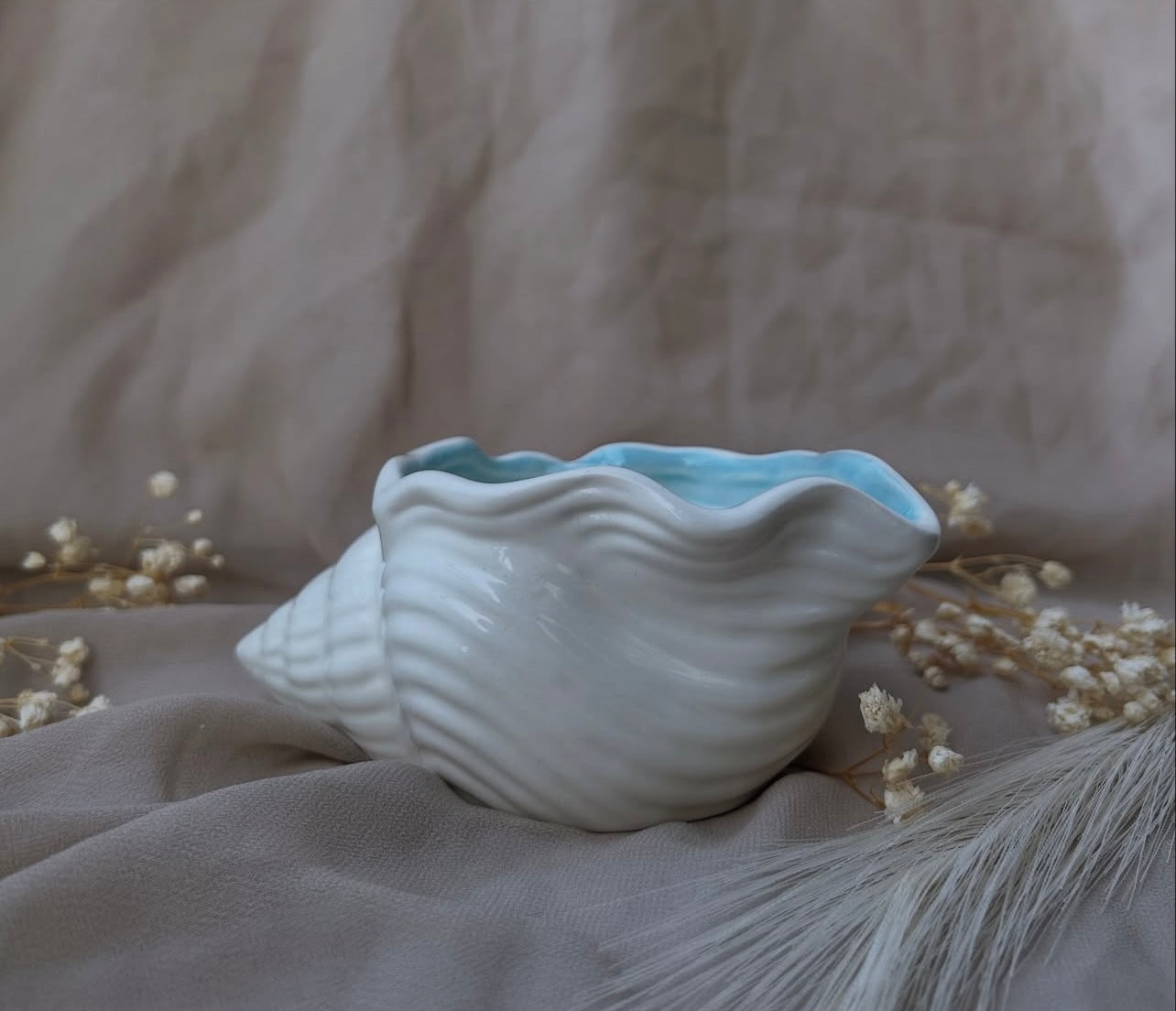 Vela decorativa y aromática · Concha