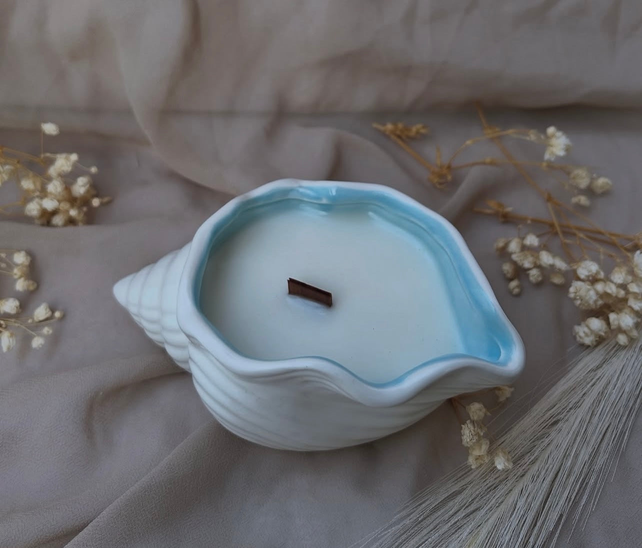 Vela decorativa y aromática · Concha